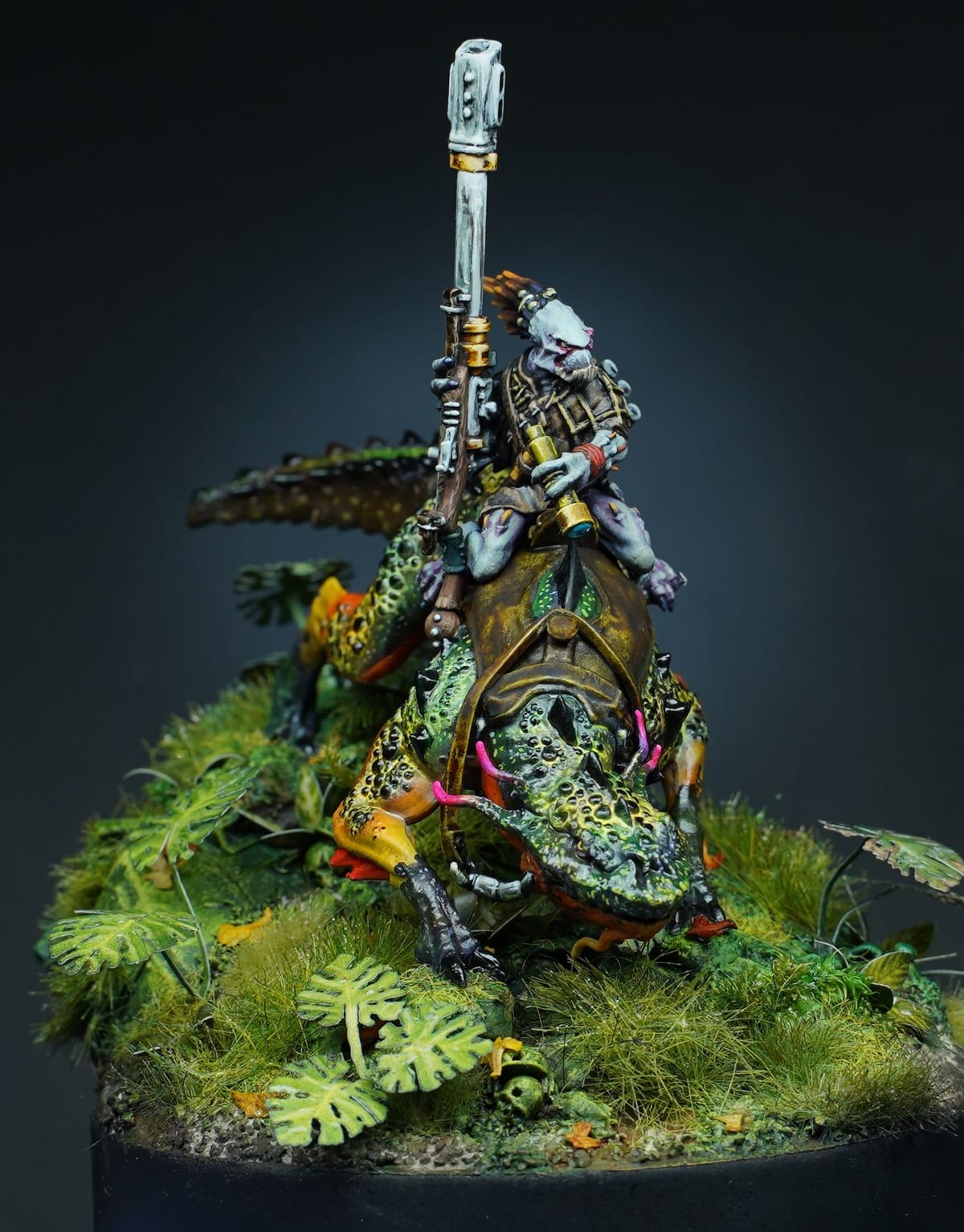 A knight raising a white sword on a base of moss and grass, against a dark background