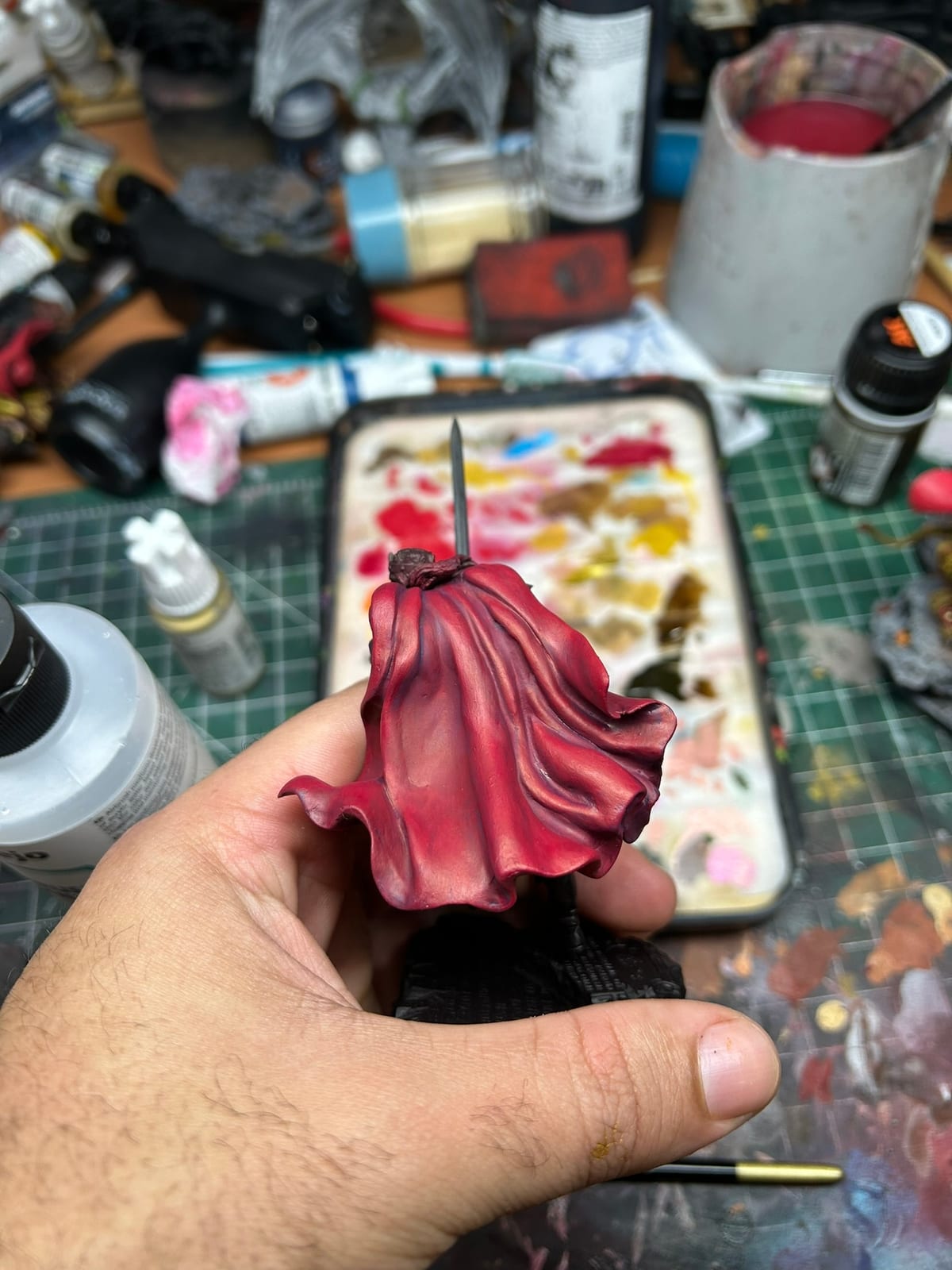 Work in progress, January 2024: painting the red cloak