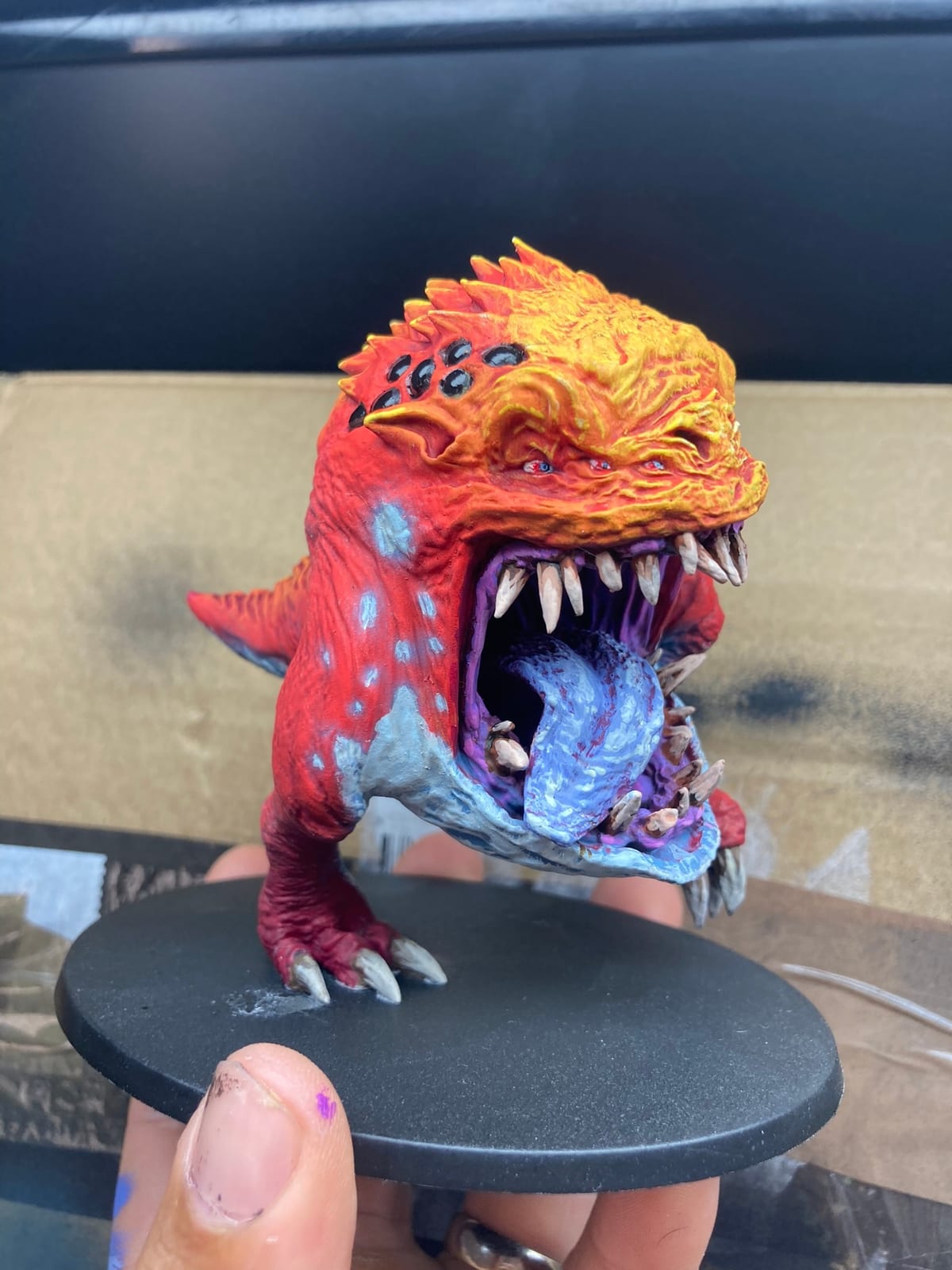Work in progress, May 2023: the squig painted in reds and oranges